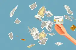 Several credit cards raining down into a large open wallet